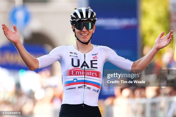 Tadej Pogacar of Slovenia and UAE Team Emirates celebrates at finish line as race winner during the 117th Il Lombardia 2023 a 238km one day race from...