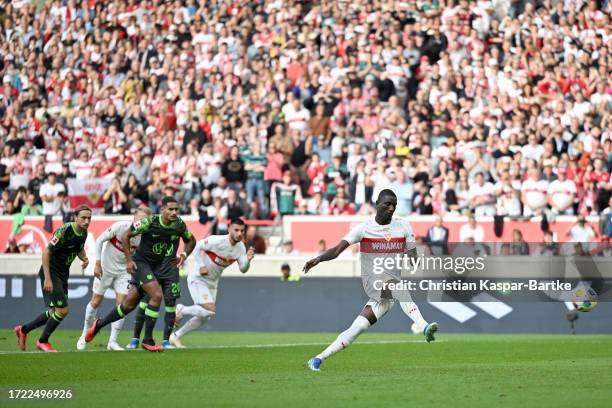 Sehrou Guirassy of VfB Stuttgart scores the team's first goal from a penalty during the Bundesliga match between VfB Stuttgart and VfL Wolfsburg at...