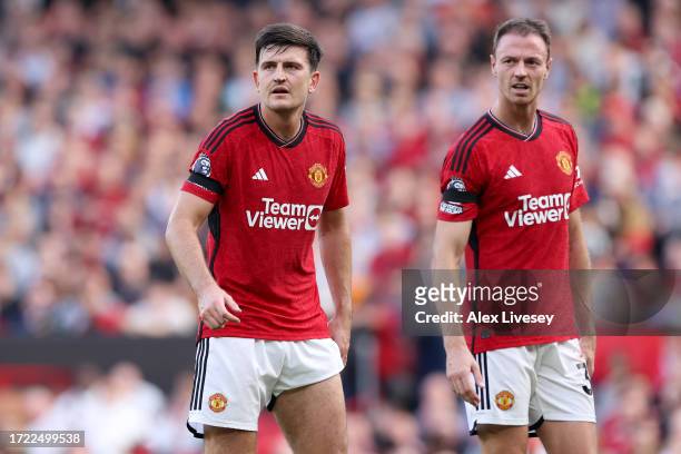 Harry Maguire and Jonny Evans of Manchester United look on during the Premier League match between Manchester United and Brentford FC at Old Trafford...