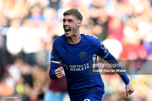 Cole Palmer of Chelsea celebrates after scoring their sides second goal from the penalty spot during the Premier League match between Burnley FC and...