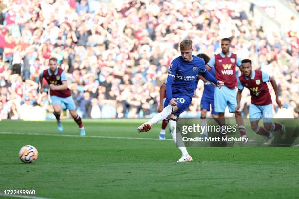 Cole Palmer of Chelsea scores their sides second goal from the penalty spot during the Premier League match between Burnley FC and Chelsea FC at Turf...