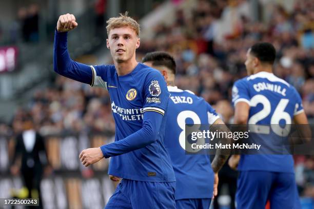 Cole Palmer of Chelsea celebrates after scoring their sides second goal from the penalty spot during the Premier League match between Burnley FC and...