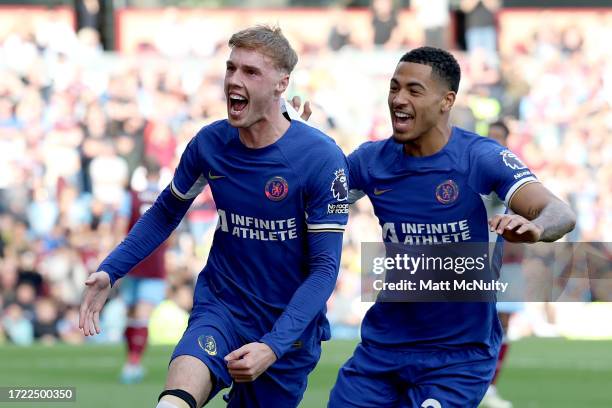 Cole Palmer of Chelsea celebrates after scoring their sides second goal from the penalty spot during the Premier League match between Burnley FC and...