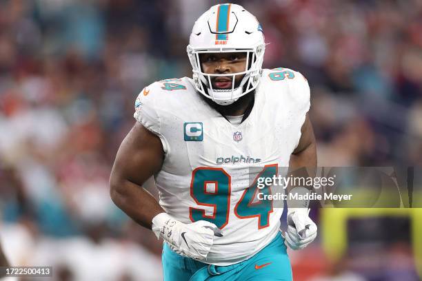 Christian Wilkins of the Miami Dolphins looks on during the game against the New England Patriots at Gillette Stadium on September 17, 2023 in...