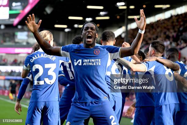 Axel Disasi of Chelsea celebrates after Cole Palmer of Chelsea scores their sides second goal from the penalty spot during the Premier League match...