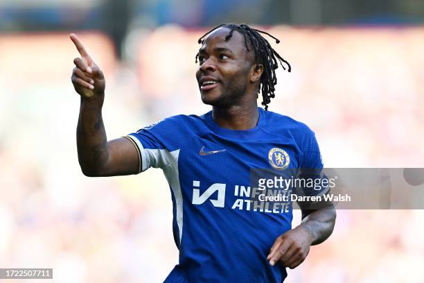 Raheem Sterling of Chelsea celebrates after scoring their sides third goal during the Premier League match between Burnley FC and Chelsea FC at Turf...