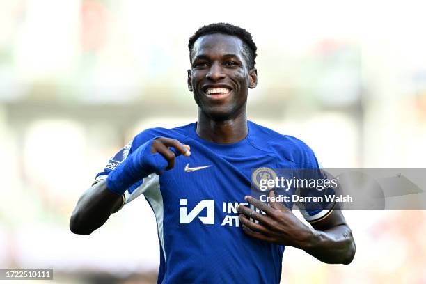 Nicolas Jackson of Chelsea celebrates after scoring their sides fourth goal during the Premier League match between Burnley FC and Chelsea FC at Turf...