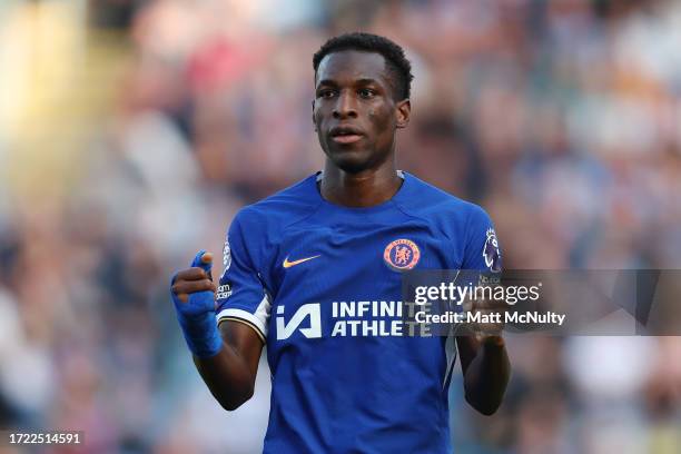 Nicolas Jackson of Chelsea celebrates after scoring their sides fourth goal during the Premier League match between Burnley FC and Chelsea FC at Turf...