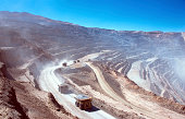 Ore trucks in an open-pit mine