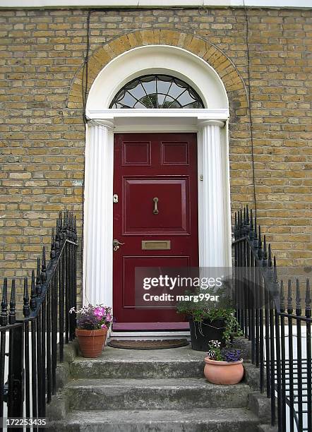 red door - doorstep stock pictures, royalty-free photos & images