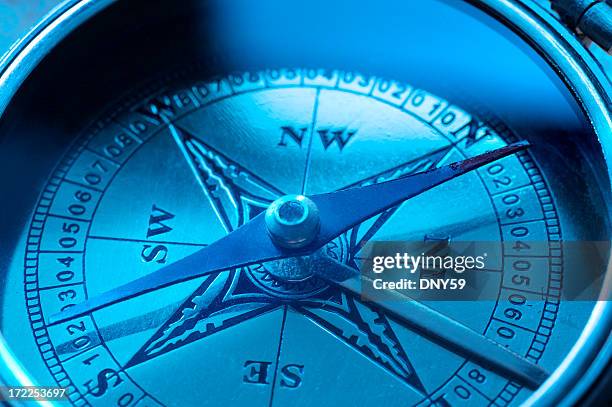 close up of face of deep blue compass - sailing compass stock pictures, royalty-free photos & images