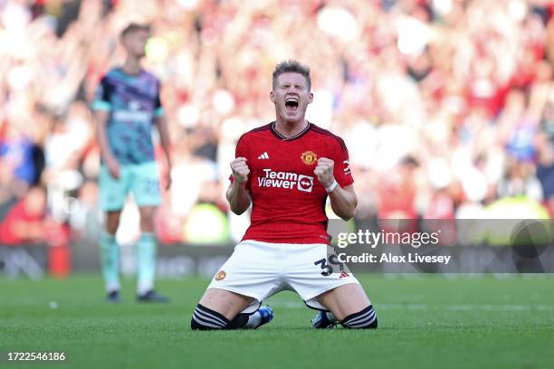 Scott McTominay of Manchester United celebrates following their sides victory after the Premier League match between Manchester United and Brentford...