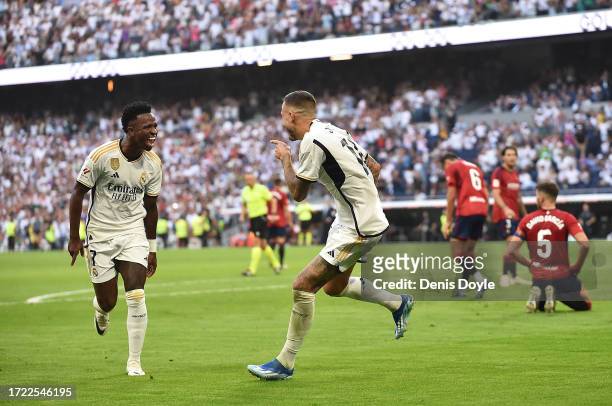 Joselu of Real Madrid celebrates with Vinicius Junior after scoring their team's 4th goal scores their team's 4th goal during the LaLiga EA Sports...