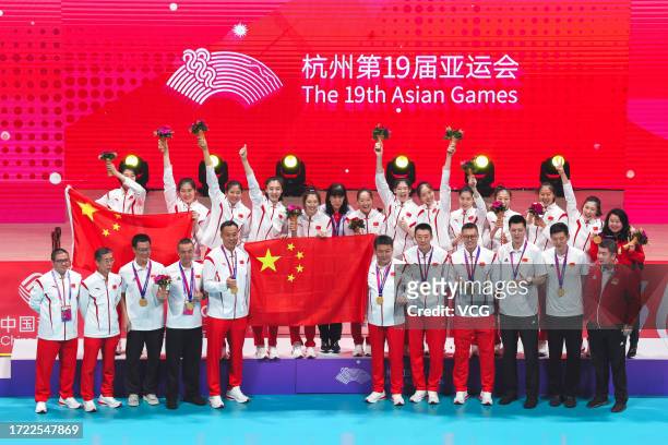 Gold medalists Team China pose during the medal ceremony for the Volleyball - Women's Final on day 14 of the 19th Asian Games at Hangzhou Normal...