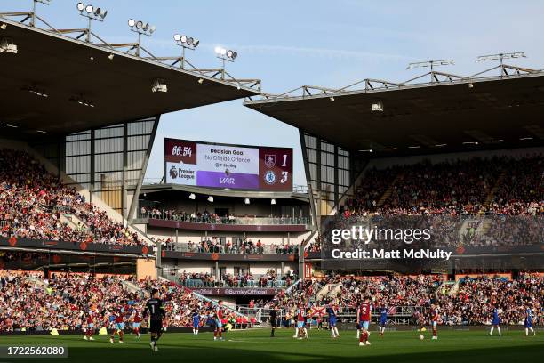 The LED board shows a VAR check for possible offside during the Premier League match between Burnley FC and Chelsea FC at Turf Moor on October 07,...
