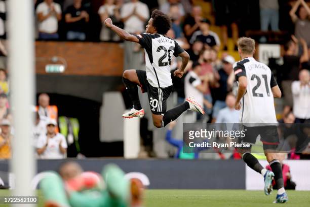 Willian of Fulham celebrates after scoring the team's third goal during the Premier League match between Fulham FC and Sheffield United at Craven...