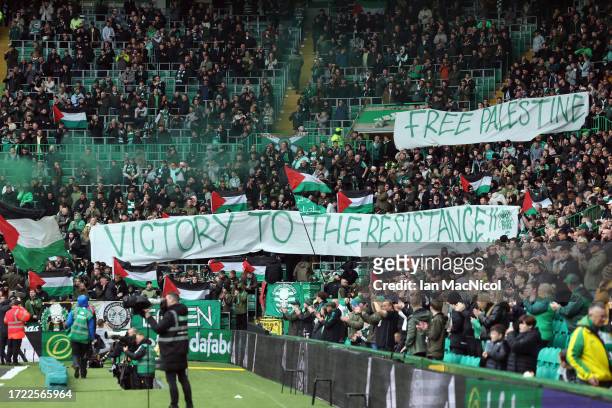 Celtic fans display a banner during the Cinch Scottish Premiership match between Celtic FC and Kilmarnock FC at Celtic Park Stadium on October 07,...