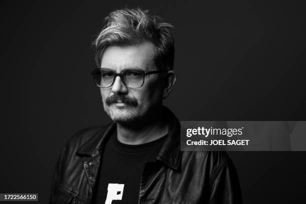 French cartoonist known by his pen name Luz, former contributor to the satirical magazine Charlie Hebdo, poses during a photo session in Paris on...