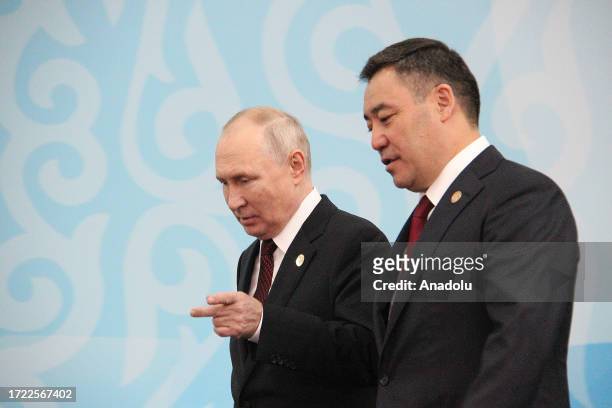 Kyrgyz President Sadyr Japarov greets Russian President Vladimir Putin during the Commonwealth of Independent States' Heads of States Summit at the...