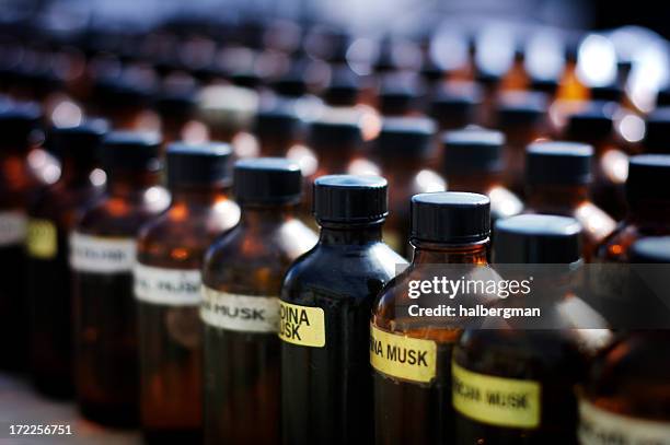 scent bottles - musk stock pictures, royalty-free photos & images