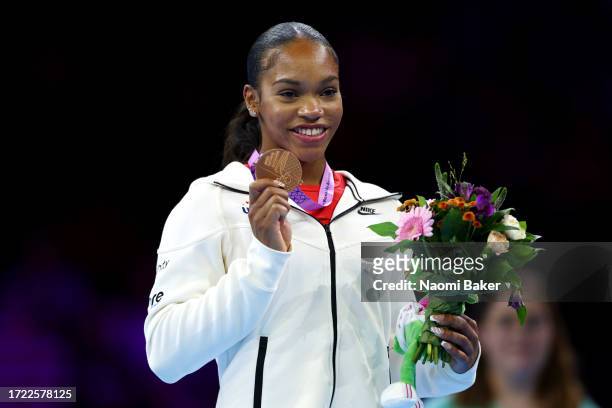 Bronze medalist Shilese Jones of Team United States poses for a photo during the medal ceremony for the Women's Uneven Bars Final on Day Eight of the...