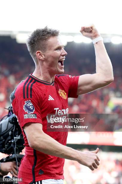 Scott McTominay of Manchester United celebrates following their sides victory after the Premier League match between Manchester United and Brentford...