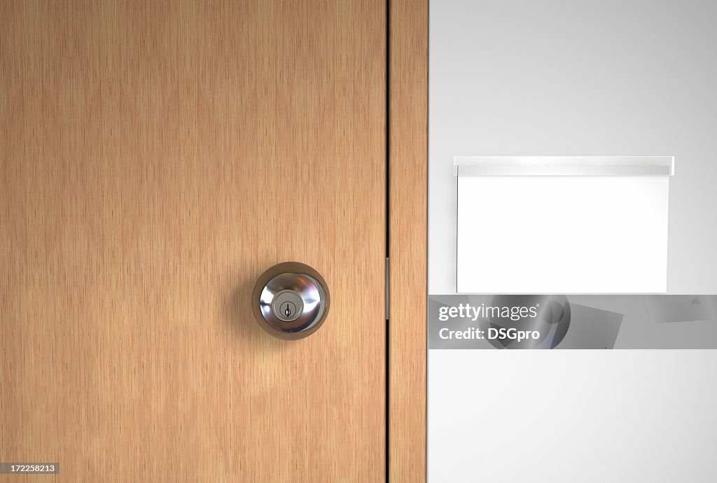 A blank name logo and a stainless door handle on wooden door