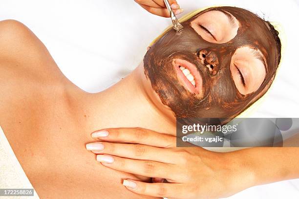 cosmetic facial mask - mottled skin stockfoto's en -beelden