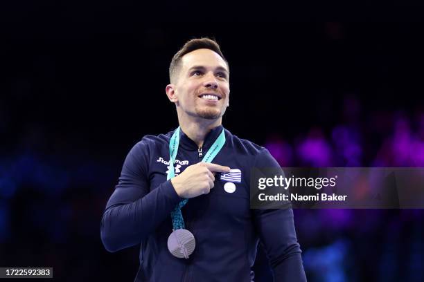 Silver medalist Eleftherios Petrounias of Team Greece reacts during the medal ceremony for the Men's Rings Final on Day Eight of the 2023 Artistic...