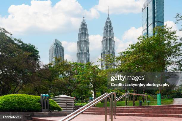 malaysian city of kuala lumpur's petronas twin towers - kuala lumpur twin tower stock pictures, royalty-free photos & images