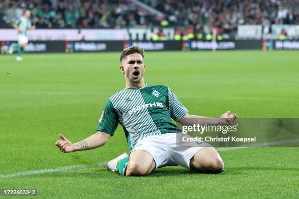 Romano Schmid of Werder Bremen celebrates after scoring the team's first goal during the Bundesliga match between SV Werder Bremen and TSG Hoffenheim...