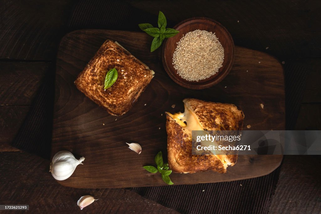 Grilled Cheese Sandwich On A Dark Rustic Background