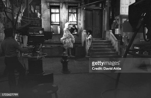 Puppeteer Caroll Spinney as 'Big Bird,' actor Matt Robinson , and actress Loretta Long during the taping of Sesame Street's very first season, taken...