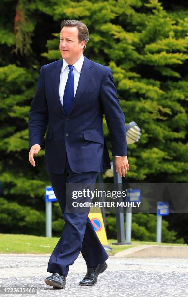 Britian's Prime Minister David Cameron arrives at Stormont Castle in Belfast, Northern Ireland, on June 9, 2011. Cameron later addressed the Stormont...