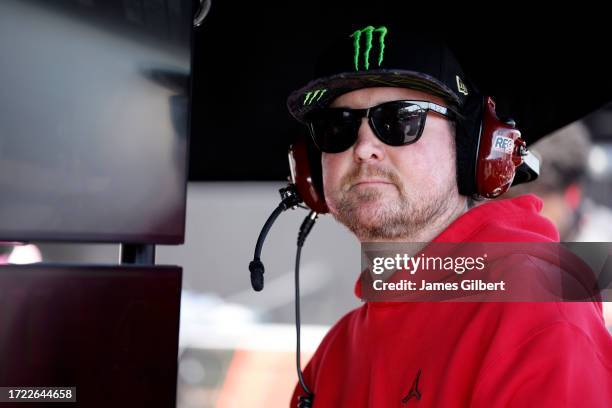 Retired NASCAR driver and advisor to 23XI Racing, Kurt Busch looks on in the garage area during practice for the NASCAR Cup Series Bank of America...