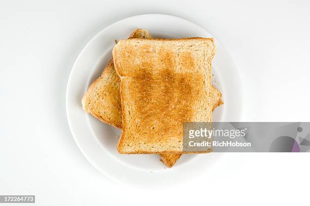 two slices of toast - rostbröd bildbanksfoton och bilder