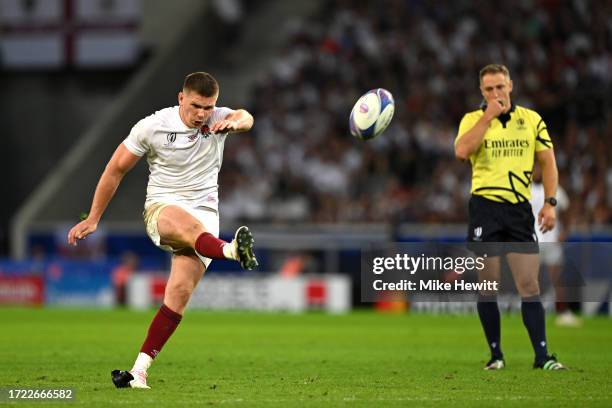 Owen Farrell of England converts their kick after being awarded a penalty, which is later ruled out after exceeding the Shot Clock Timer, during the...