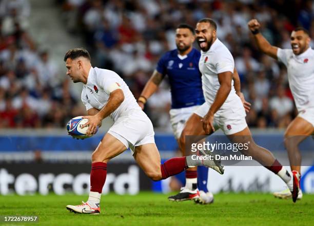 Danny Care of England breaks through the Samoa defence as he scores his team's second try during the Rugby World Cup France 2023 match between...