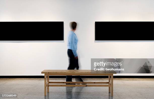 art inspiration - person standing infront of wall stockfoto's en -beelden