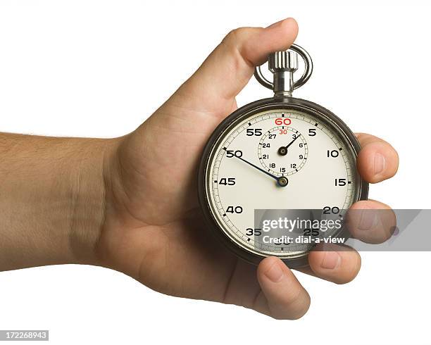 hand holding a large analogue stop watch - seconds of summer sydney photo shoot stockfoto's en -beelden