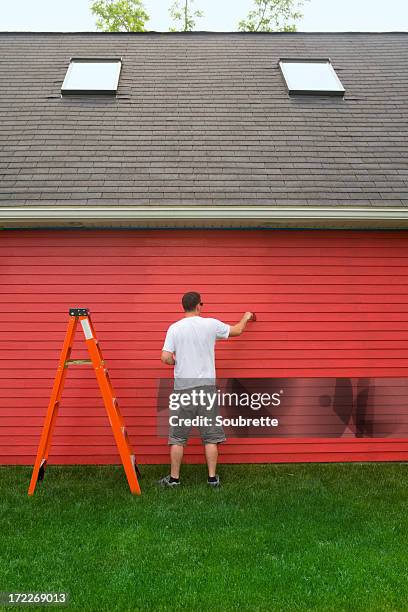 home improvement - painting house exterior stock pictures, royalty-free photos & images