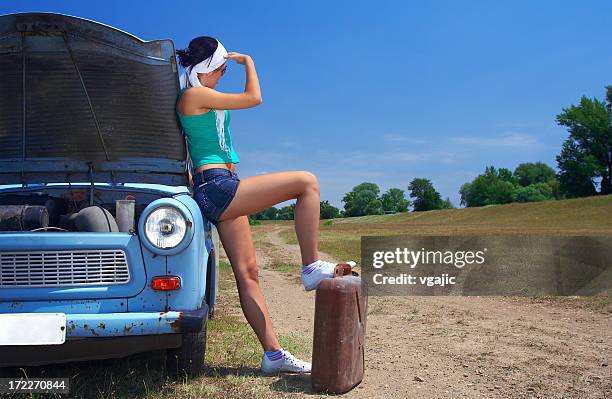 woman left with no gasoline - canister stock pictures, royalty-free photos & images