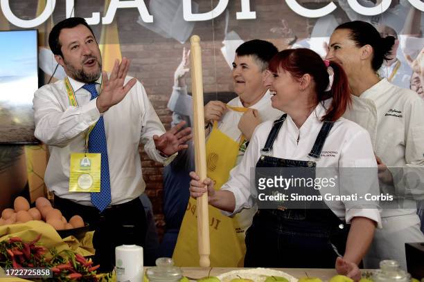 The Vice Premier and Minister of Transport Matteo Salvini visits the Coldiretti Village at the Circus Maximus and jokes with the cooks who show a...