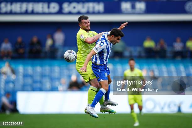 Tom Edwards of Huddersfield Town wins a header during the Sky Bet Championship match between Sheffield Wednesday and Huddersfield Town at...