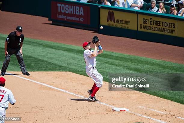 Brendan Harris of the Los Angeles Angels of Anaheim catches a popup for an out during the game against the New York Yankees on Sunday, June 16, 2013...