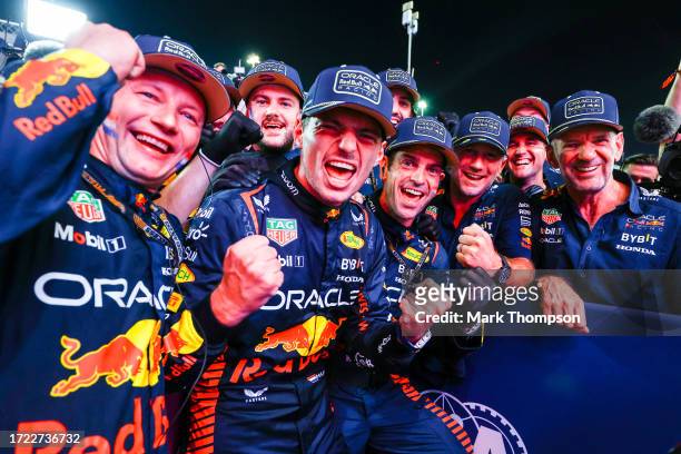 World Drivers Champion Max Verstappen of the Netherlands and Oracle Red Bull Racing celebrates with his team in parc ferme after the Sprint ahead of...