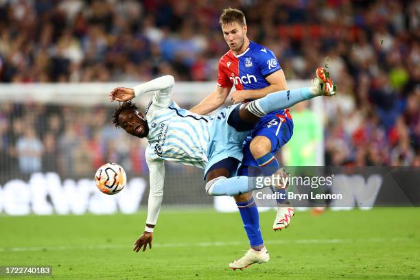 Divock Origi of Nottingham Forest clashes with Joachim Andersen of Crystal Palace during the Premier League match between Crystal Palace and...