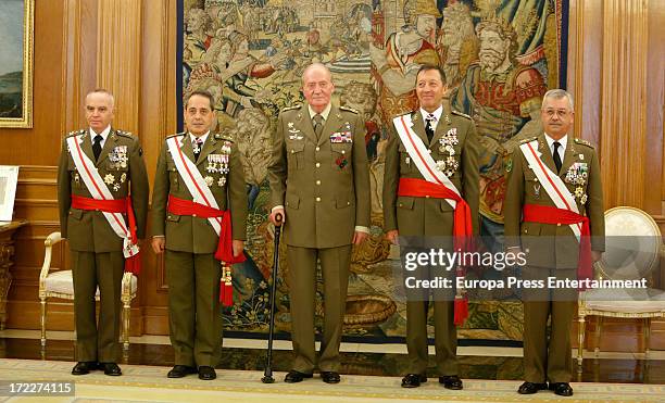 King Juan Carlos of Spain C) attends several military audiences at Zarzuela Palace on July 2, 2013 in Madrid, Spain. For the first time in months,...