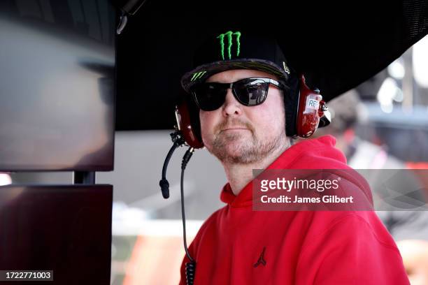 Retired NASCAR driver and advisor to 23XI Racing, Kurt Busch looks on in the garage area during practice for the NASCAR Cup Series Bank of America...