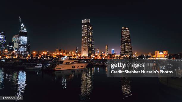 kuwait city night shot - kuwait landmark stock pictures, royalty-free photos & images